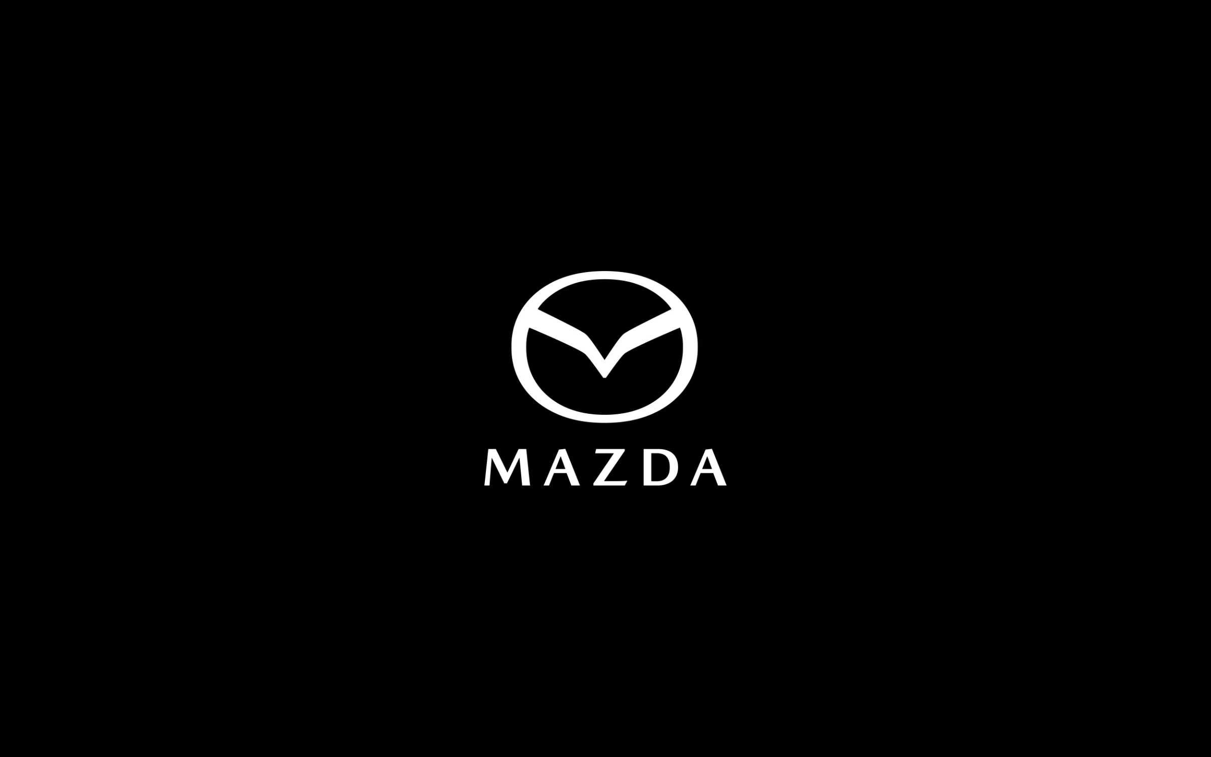 The 2026 Mazda logo on black